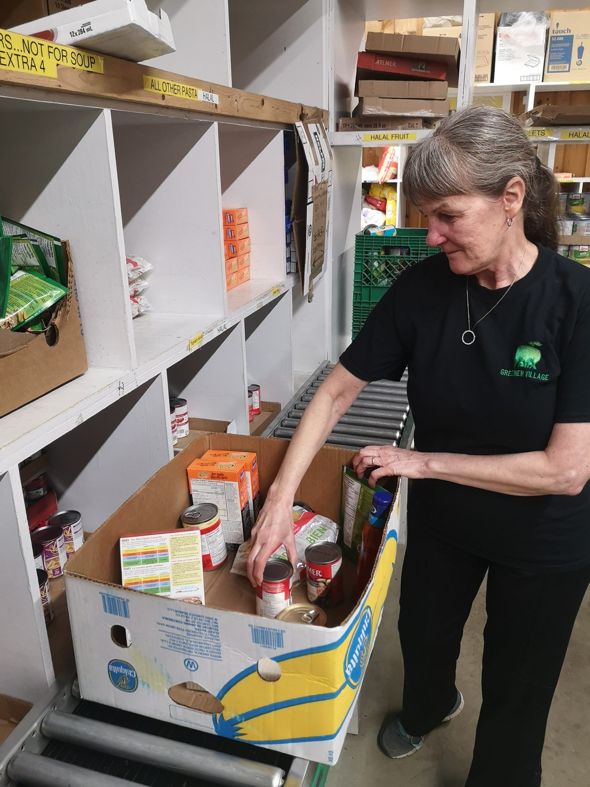 warehouse volunteer packing food