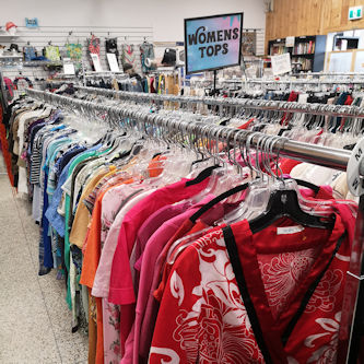 Clothing on a rack in our Unique Boutique